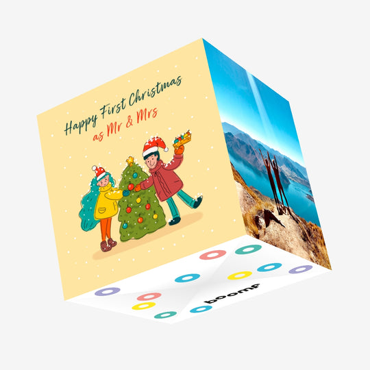 Merry First Christmas As Mr. And Mrs. Adorable Couple Decorating Christmas Tree Confetti-exploding Greetings Card