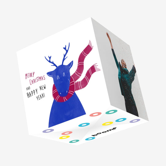 Merry Christmas And Happy New Year A Blue Reindeer Wearing A Scarf Confetti-exploding Greetings Card