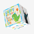 Happy Birthday Grandson A Cute Little Dino With A Balloon Confetti-exploding Greetings Card